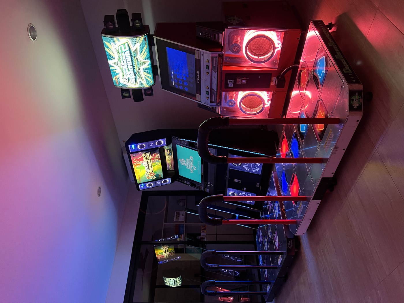 Both DDR cabinets set up side by side at home